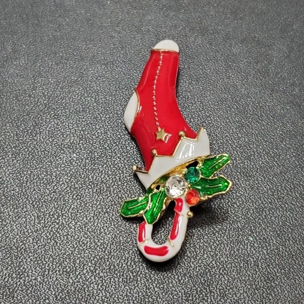 Gold tone holiday stocking filled with goodies red green white